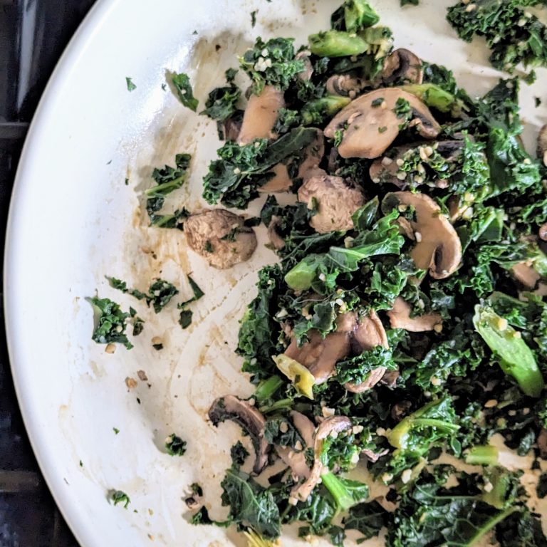 The Mighty KMG: Kale, Mushrooms, Garlic in a skillet